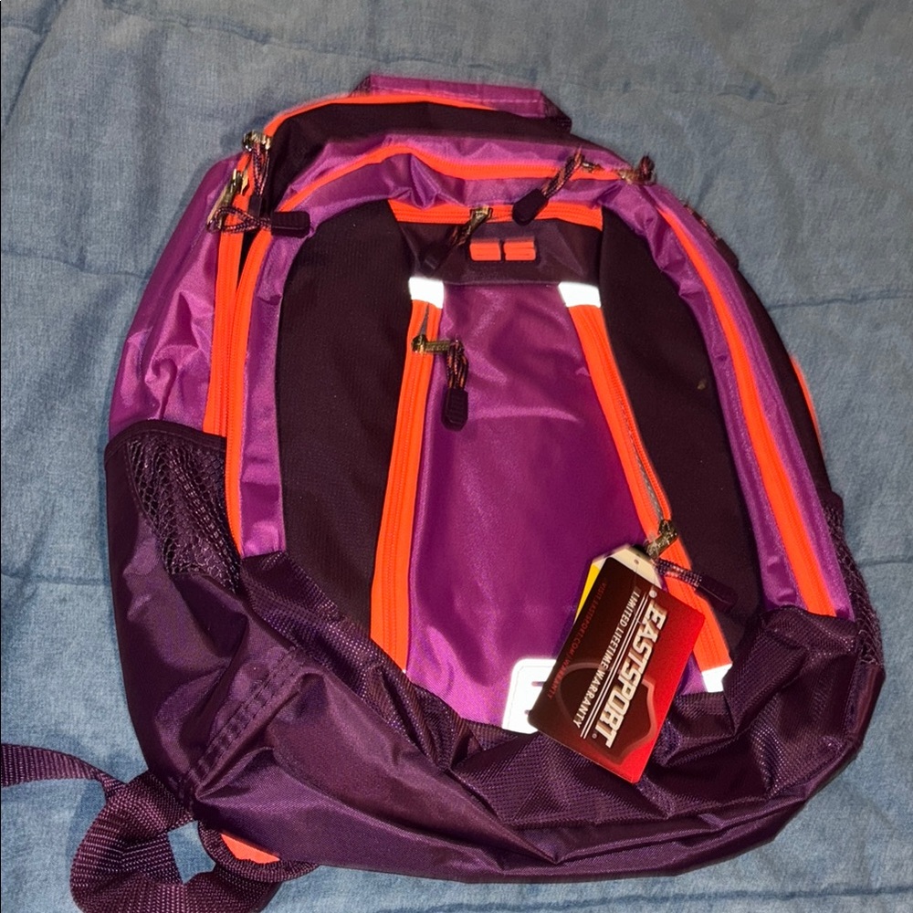 Eastport Purple and Orange Backpack 3 pockets 4 books capacity laptop pocket